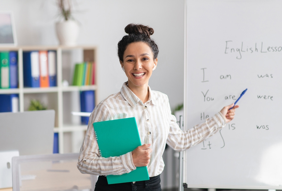 International learners taking part in an English classroom activity